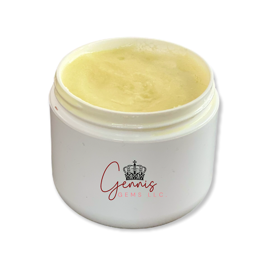 A white jar full of whipped body butter with a black crown and the words that read Genni’s Gems LLC.